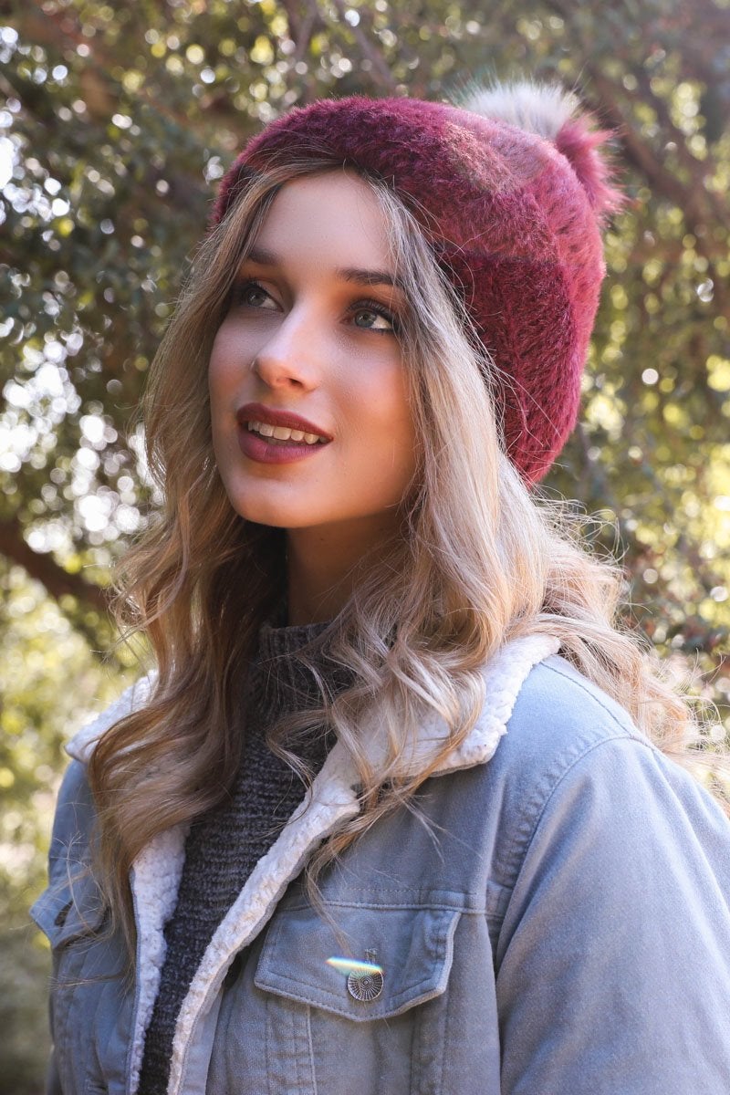 Soft Mohair Pom Beanie in a cozy winter setting, featuring a stylish pom on top and soft faux mohair fabric.