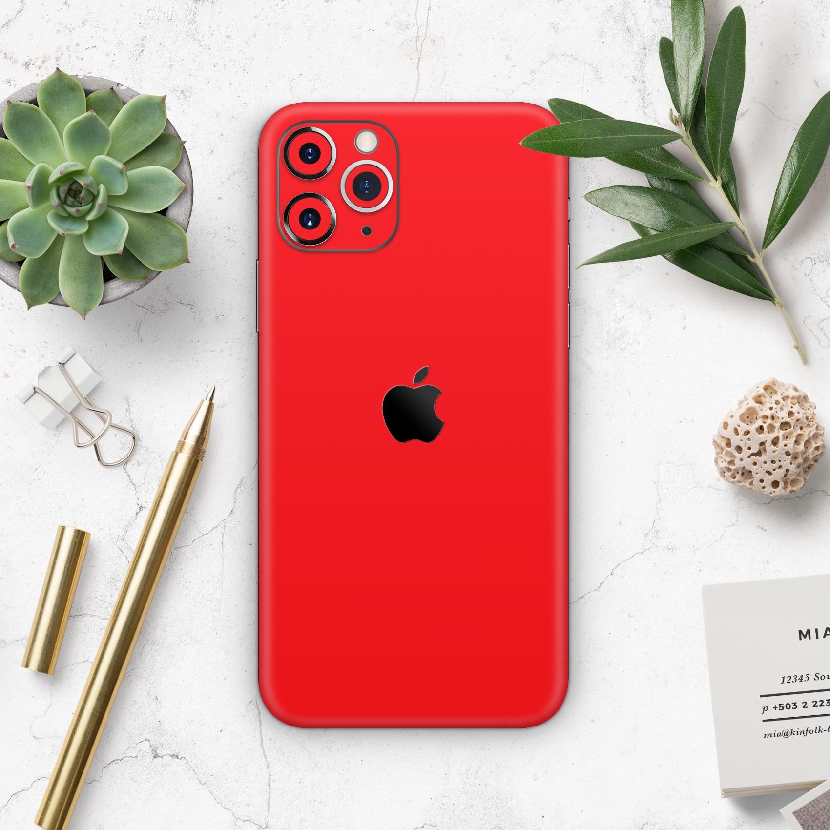 Solid Red Skin-Kit for Apple iPhone 14, 13, 12, showcasing a sleek design and premium vinyl material.