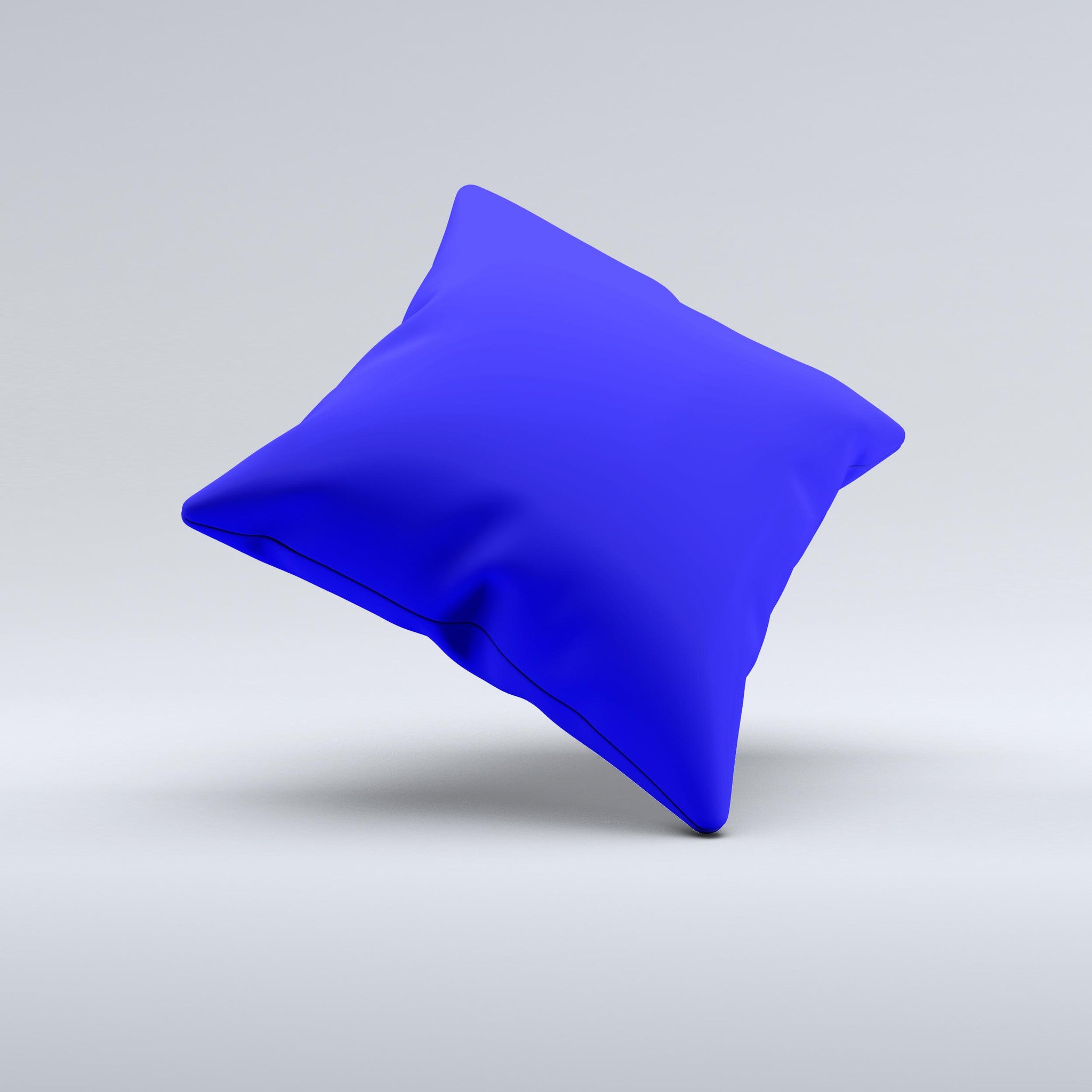 Solid royal blue decorative throw pillow with high thread count fabric, handcrafted in Virginia, showcasing unique imperfections.