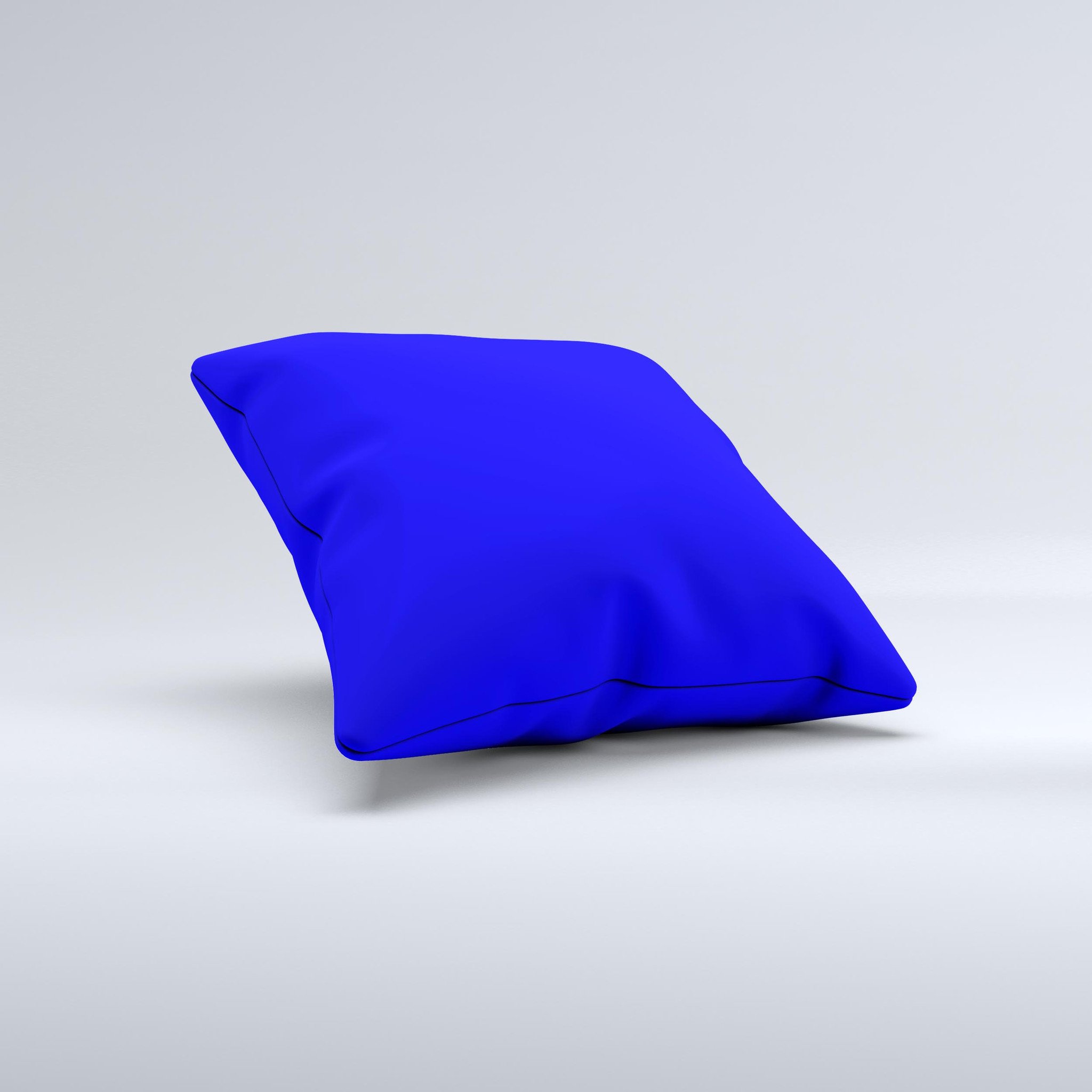 Solid royal blue decorative throw pillow with high thread count fabric, handcrafted in Virginia, showcasing unique imperfections.