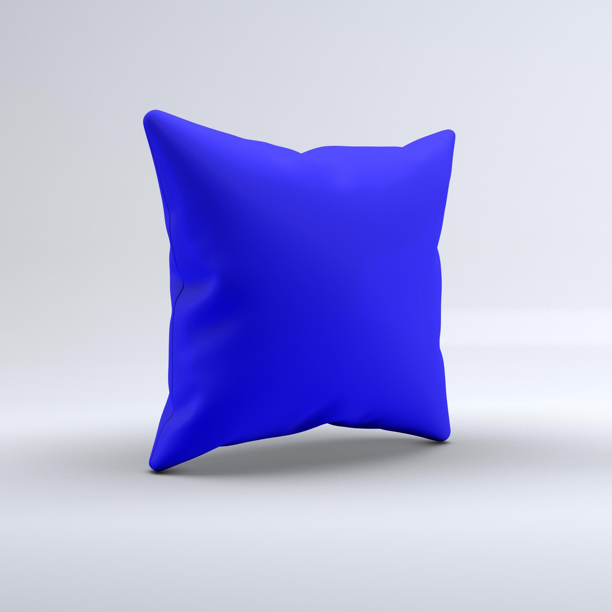 Solid royal blue decorative throw pillow with high thread count fabric, handcrafted in Virginia, showcasing unique imperfections.