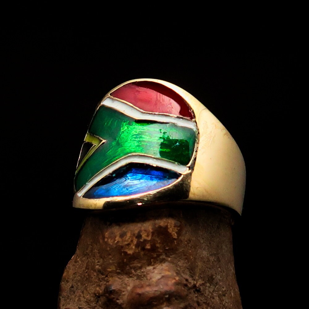 A stylish South African Flag Ring made of solid brass, featuring a vibrant flag design, perfect for pinky finger wear.