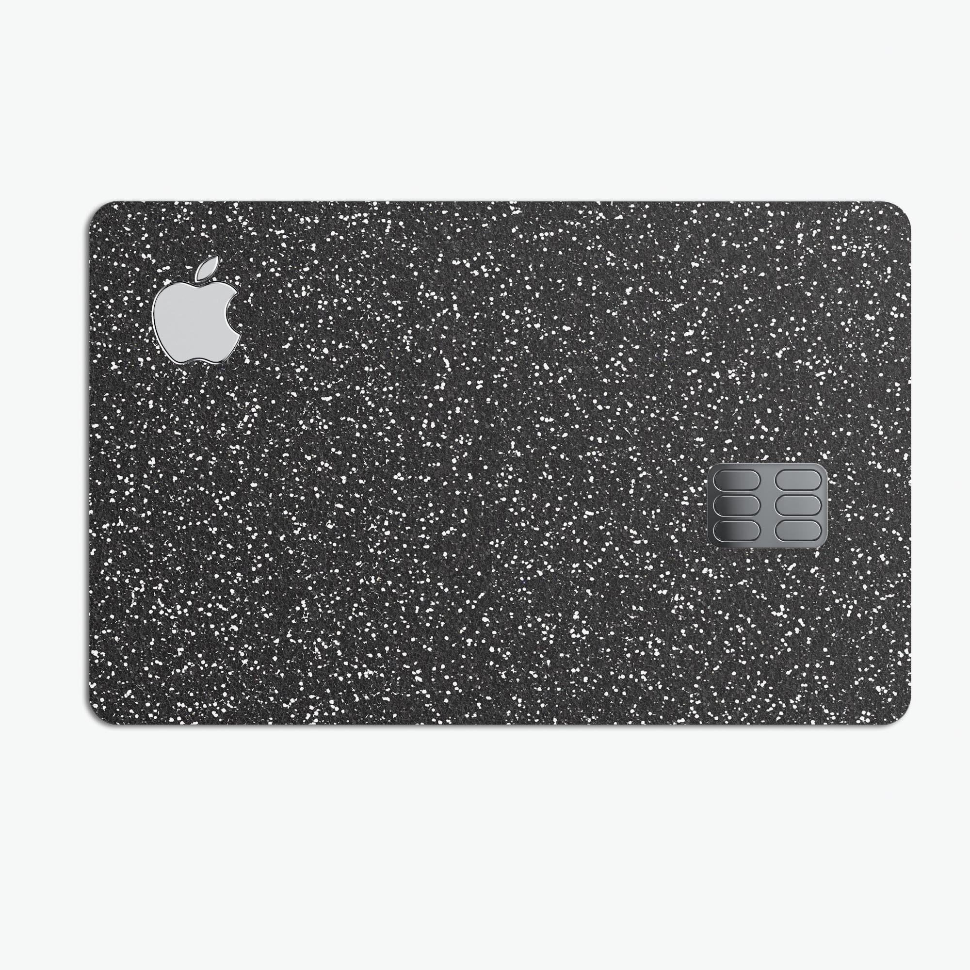 Sparkling Black Ultra Metallic Glitter decal applied on an Apple Card, showcasing its glossy finish and protective features.