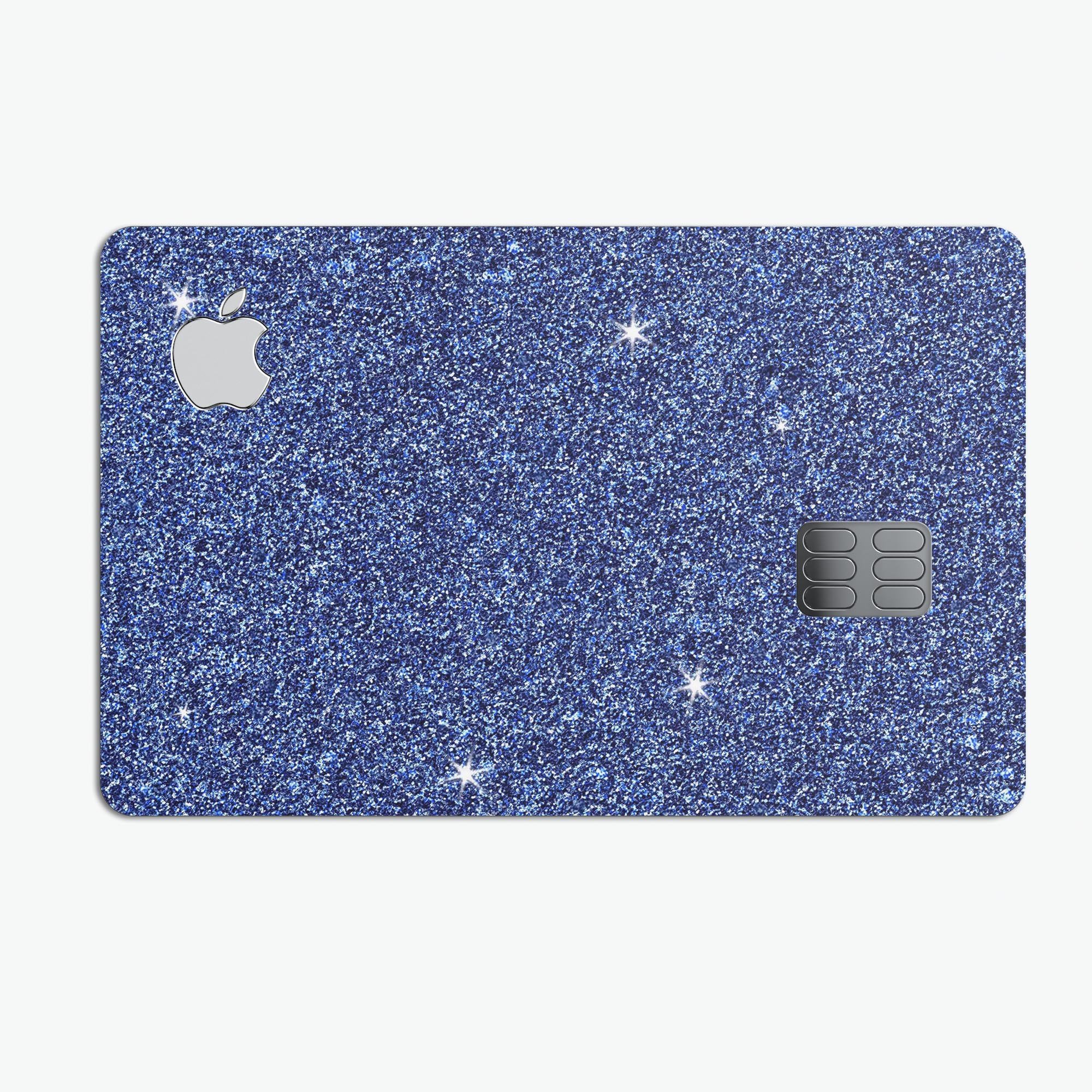 Sparkling Blue Ultra Metallic Glitter decal applied on an Apple Card, showcasing its vibrant color and glossy finish.