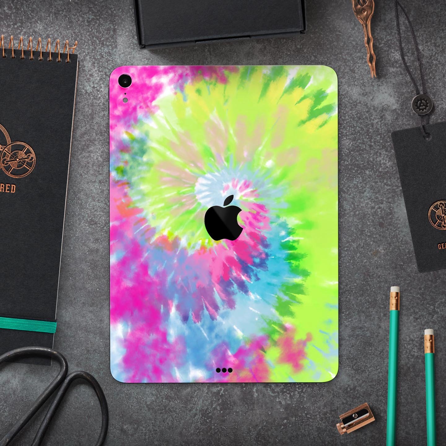 Spiral Tie Dye V7 skin decal for Apple iPad Pro 12.9", showcasing vibrant colors and a sleek design.