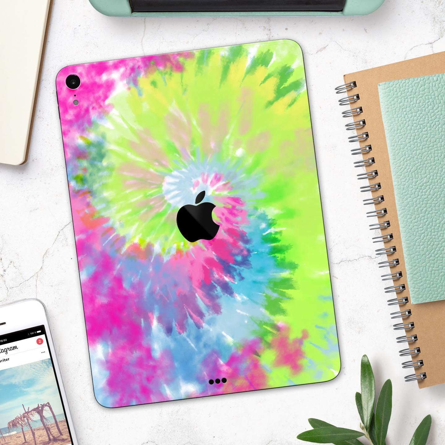 Spiral Tie Dye V7 skin decal for Apple iPad Pro 12.9", showcasing vibrant colors and a sleek design.