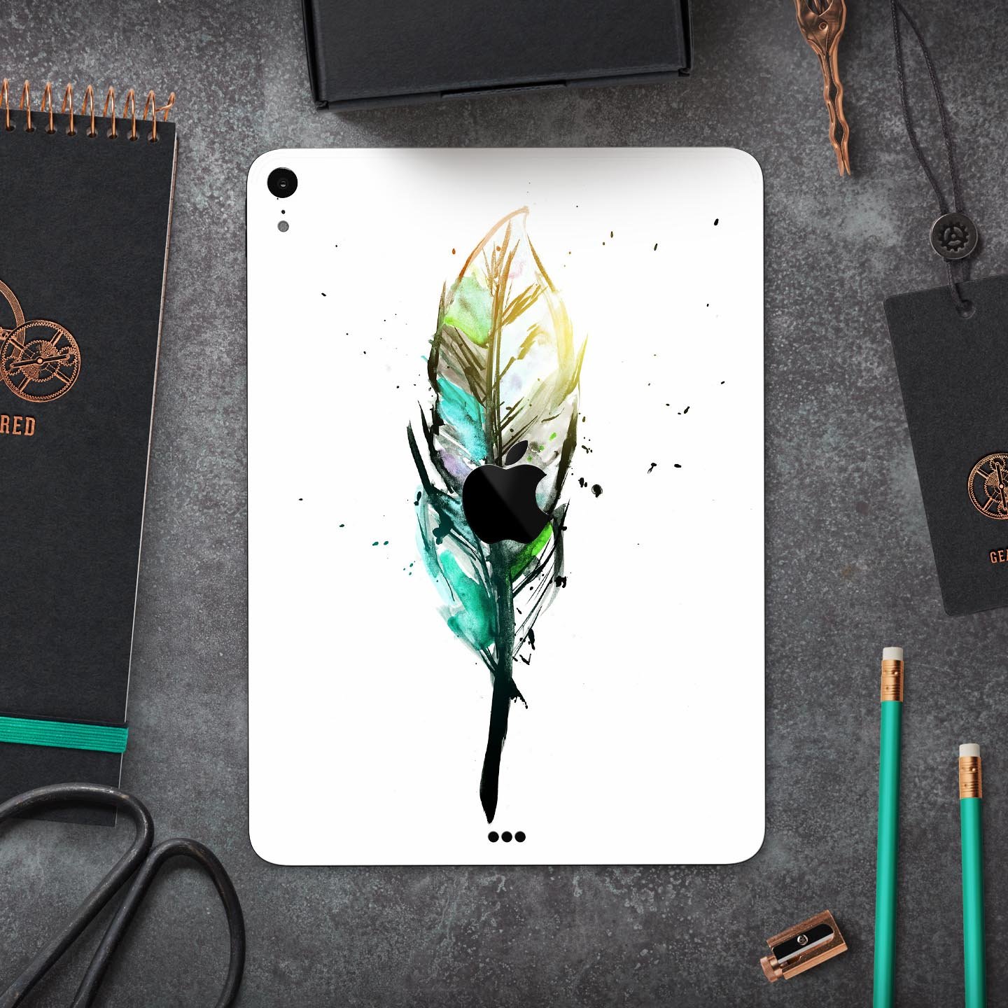 Splatter Watercolor Feather skin decal for Apple iPad, showcasing vibrant colors and artistic design.