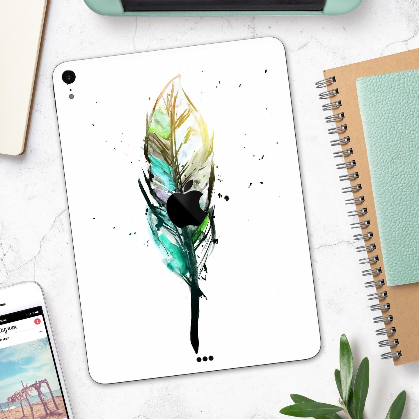 Splatter Watercolor Feather skin decal for Apple iPad, showcasing vibrant colors and artistic design.