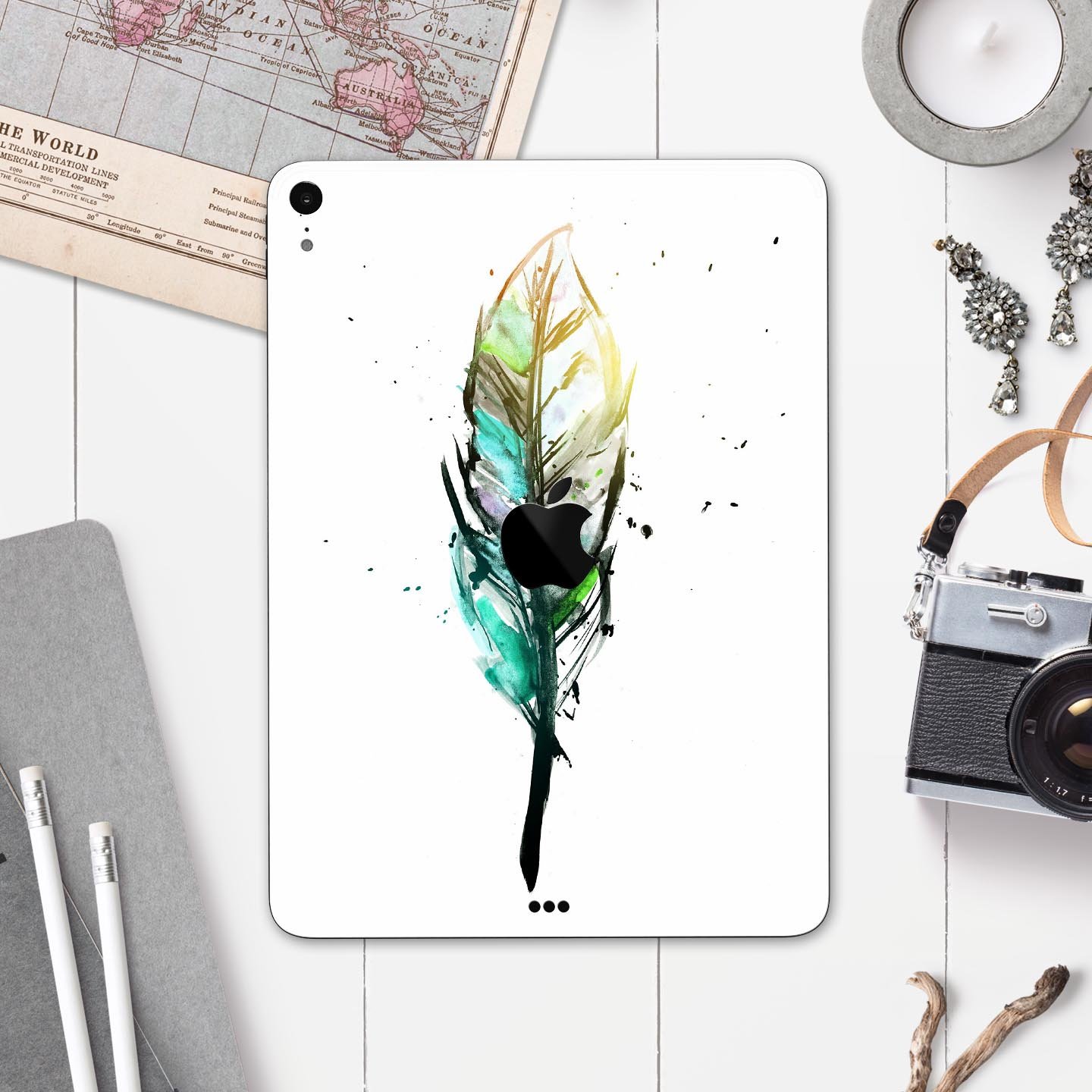 Splatter Watercolor Feather skin decal for Apple iPad, showcasing vibrant colors and artistic design.