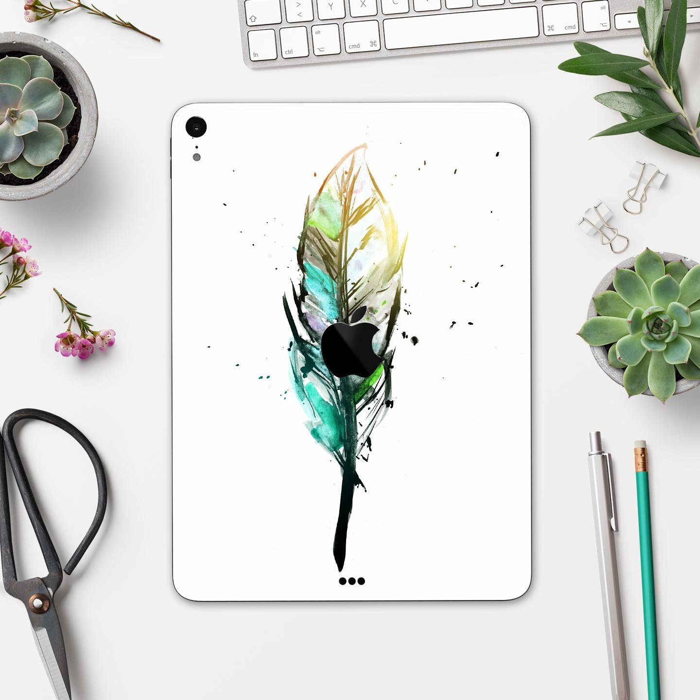 Splatter Watercolor Feather skin decal for Apple iPad, showcasing vibrant colors and artistic design.