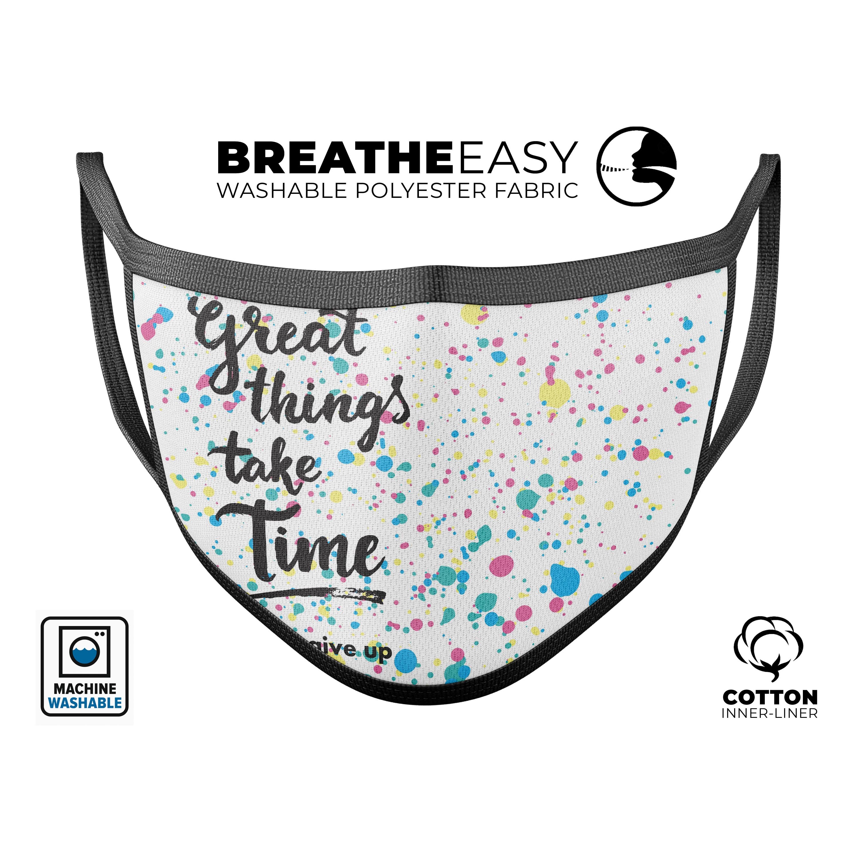 Splattered Great Things Take Time V2 mouth cover, featuring a vibrant design, adjustable ear loops, and a comfortable cotton interior.