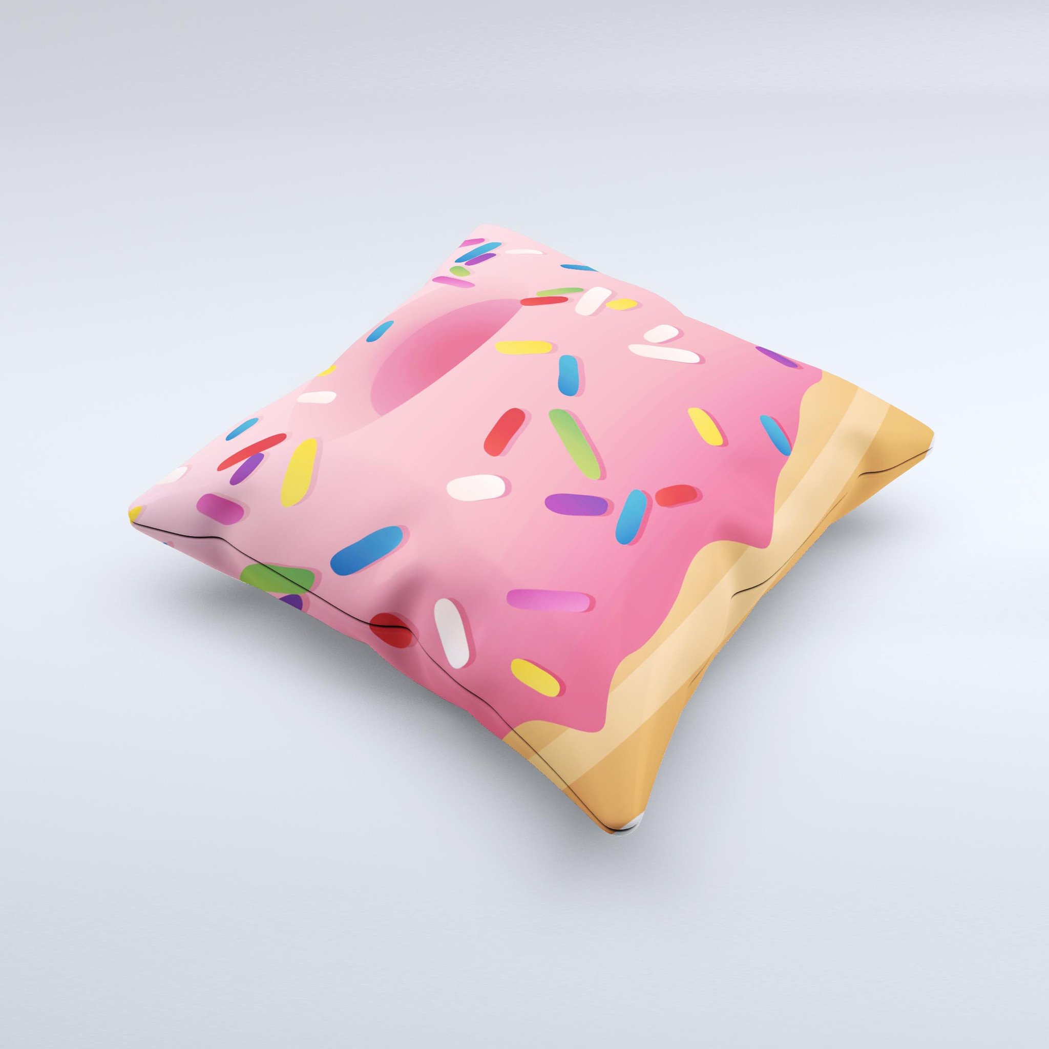 A colorful 3D donut decorative throw pillow with sprinkles, handcrafted in Virginia, showcasing unique imperfections.