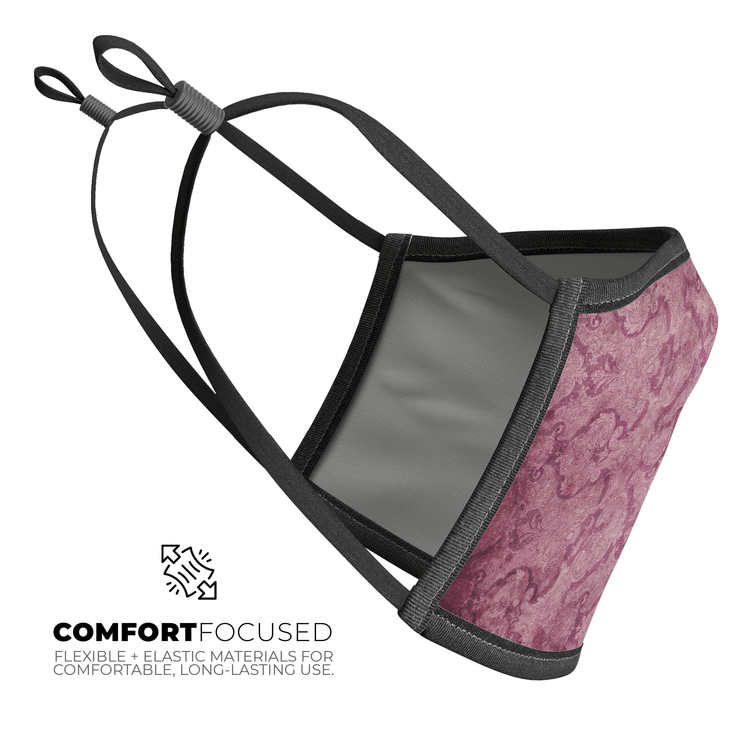 Stained Magenta Damask Pattern mouth cover, showcasing vibrant colors and adjustable ear loops for a comfortable fit.