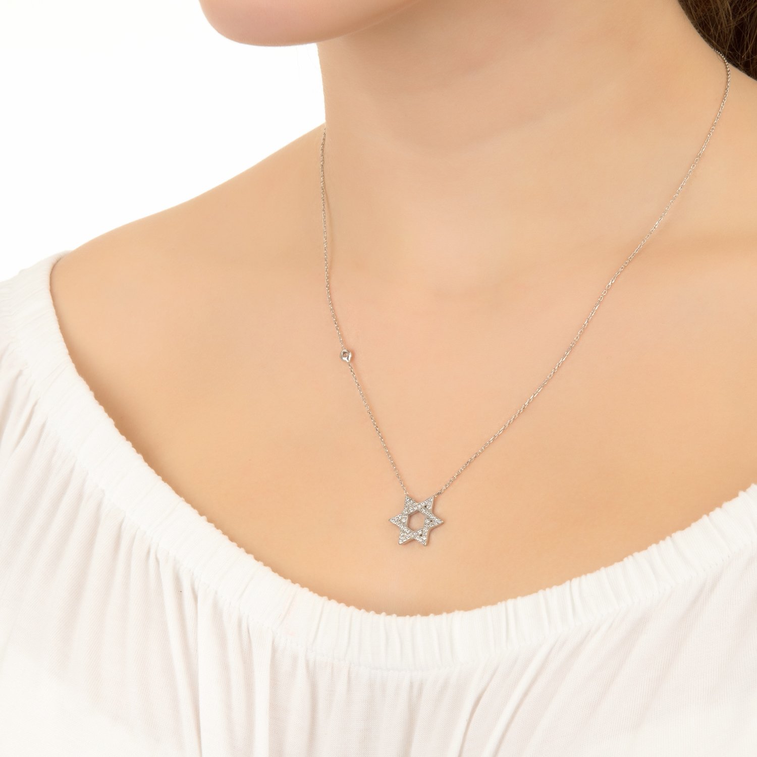 Elegant Star of David Necklace handcrafted in sterling silver with white zircons, featuring adjustable chain lengths and available in gold and rose gold finishes.