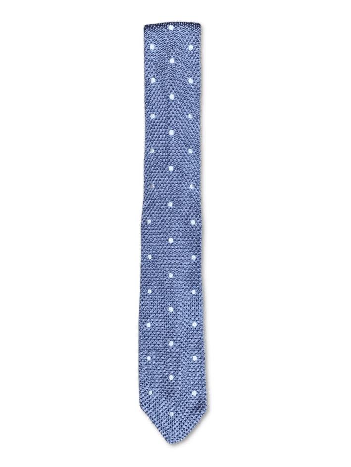 Steel blue knitted tie featuring white polka dots, elegantly designed with a pointed end.