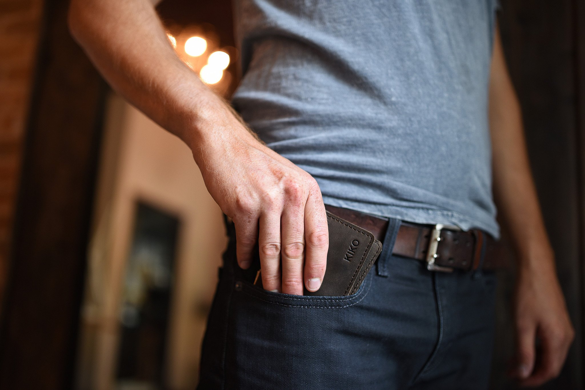 Step Up Wallet showcasing four card slots and a bill compartment in rich leather with dark stitching.