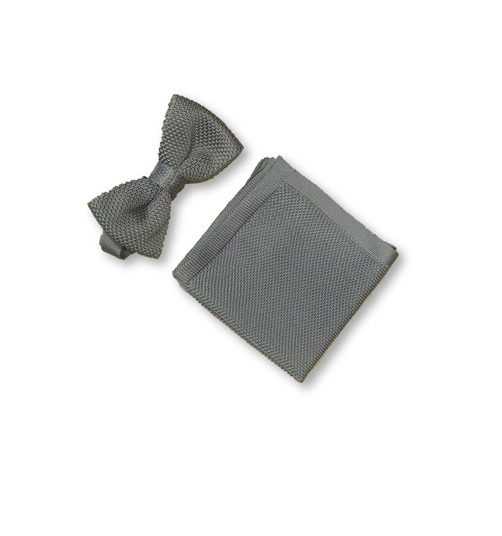 Stone grey knitted bow tie and matching pocket square set displayed elegantly, showcasing their texture and color.