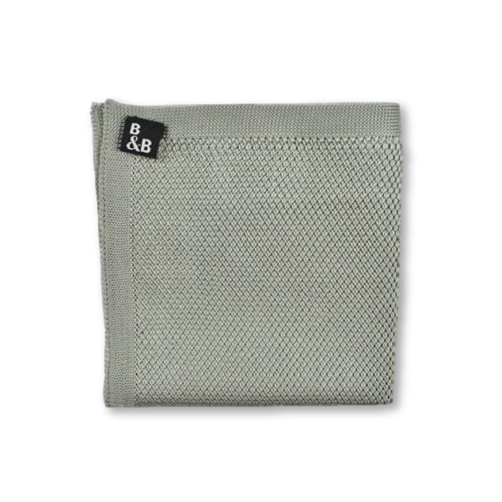 Stone grey knitted pocket square displayed elegantly, showcasing its texture and dimensions.