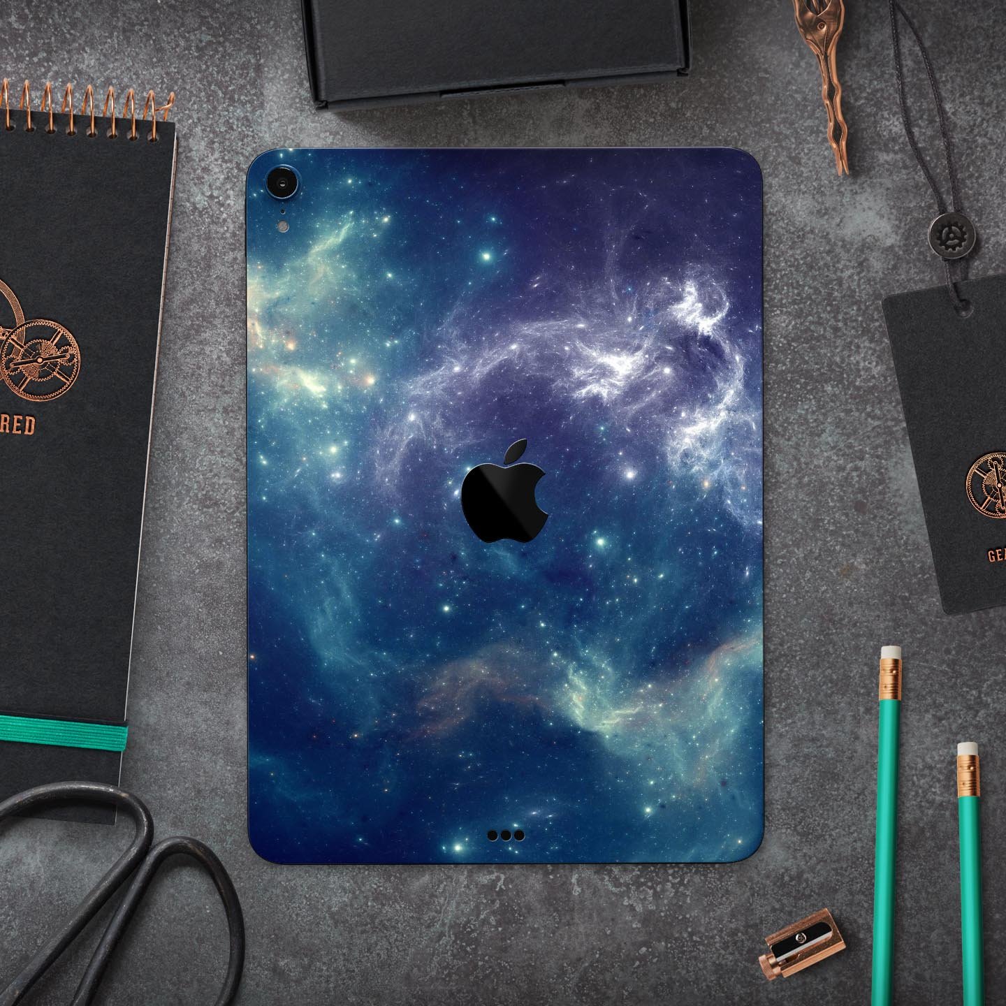 Subtle Blue and Green Nebula skin decal for Apple iPad, showcasing vibrant colors and intricate design.