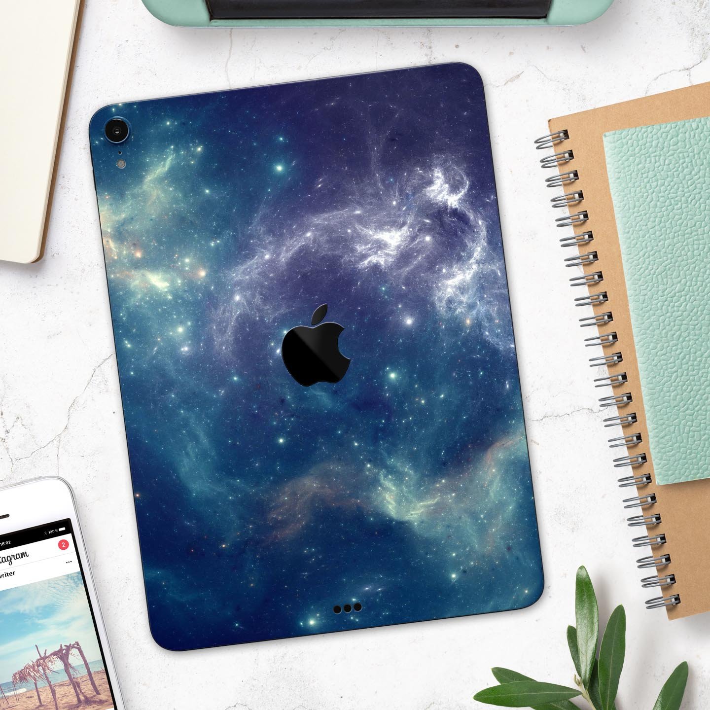 Subtle Blue and Green Nebula skin decal for Apple iPad, showcasing vibrant colors and intricate design.