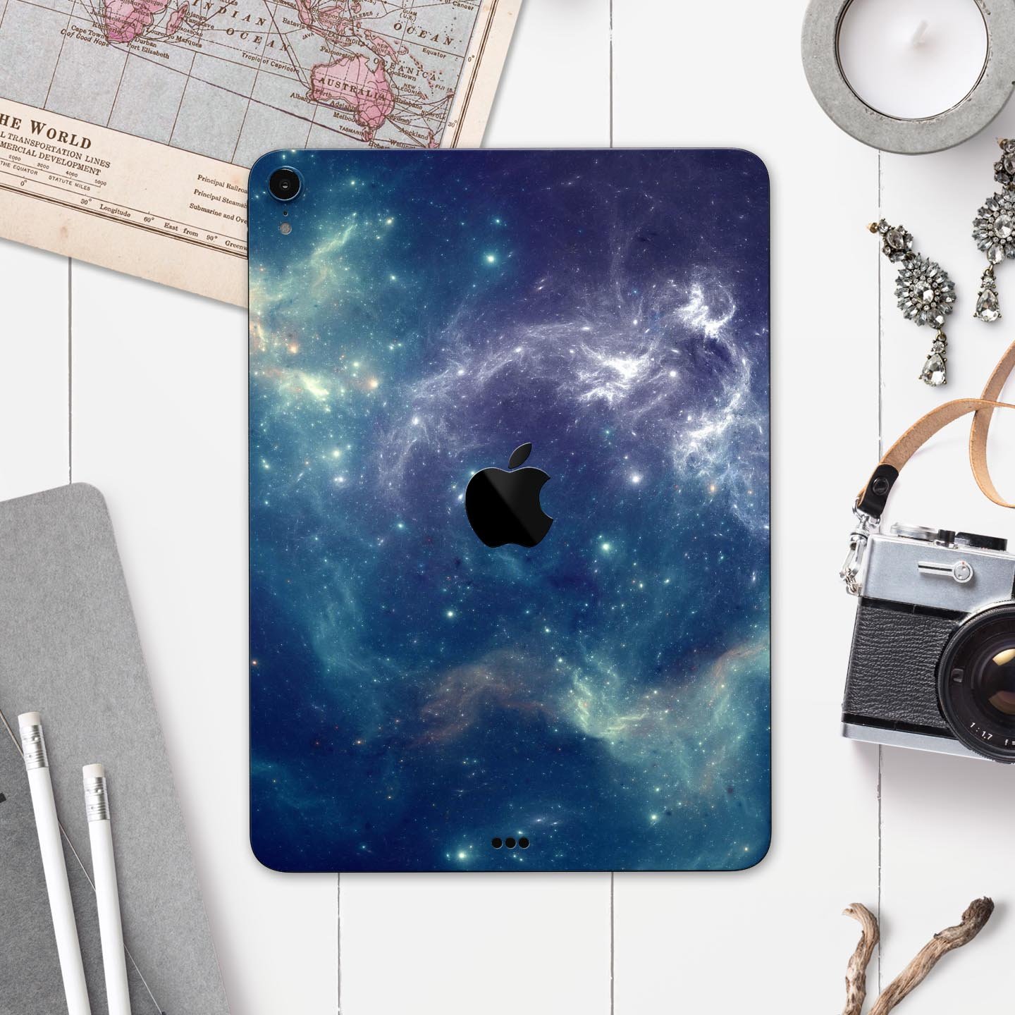 Subtle Blue and Green Nebula skin decal for Apple iPad, showcasing vibrant colors and intricate design.