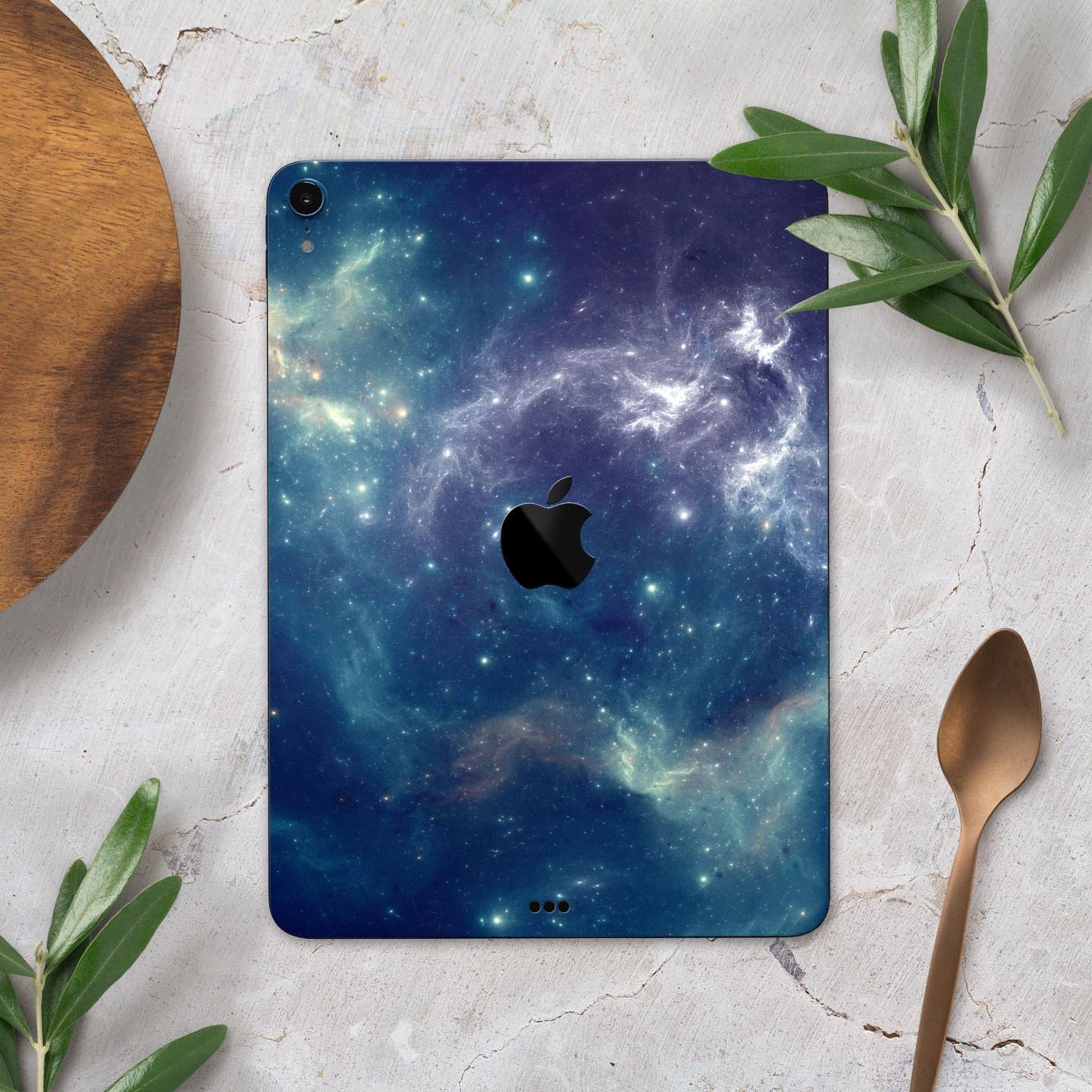 Subtle Blue and Green Nebula skin decal for Apple iPad, showcasing vibrant colors and intricate design.