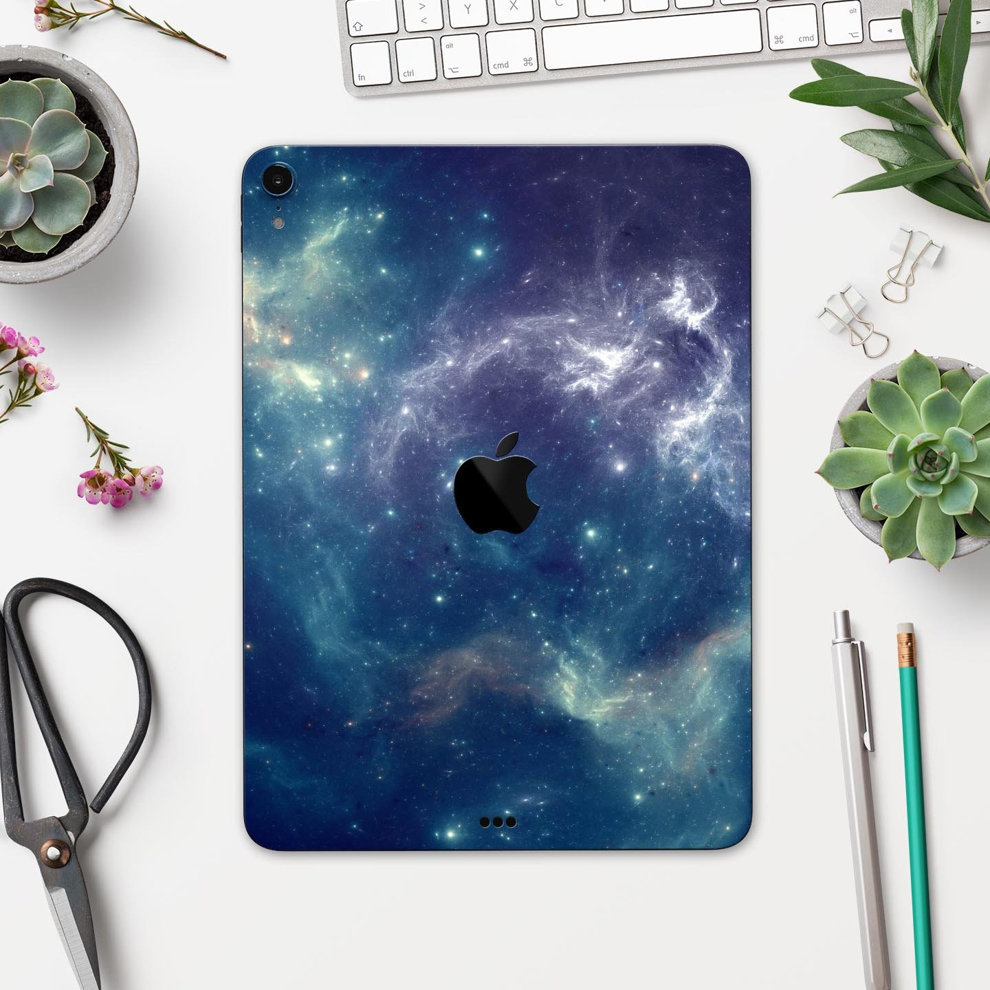 Subtle Blue and Green Nebula skin decal for Apple iPad, showcasing vibrant colors and intricate design.