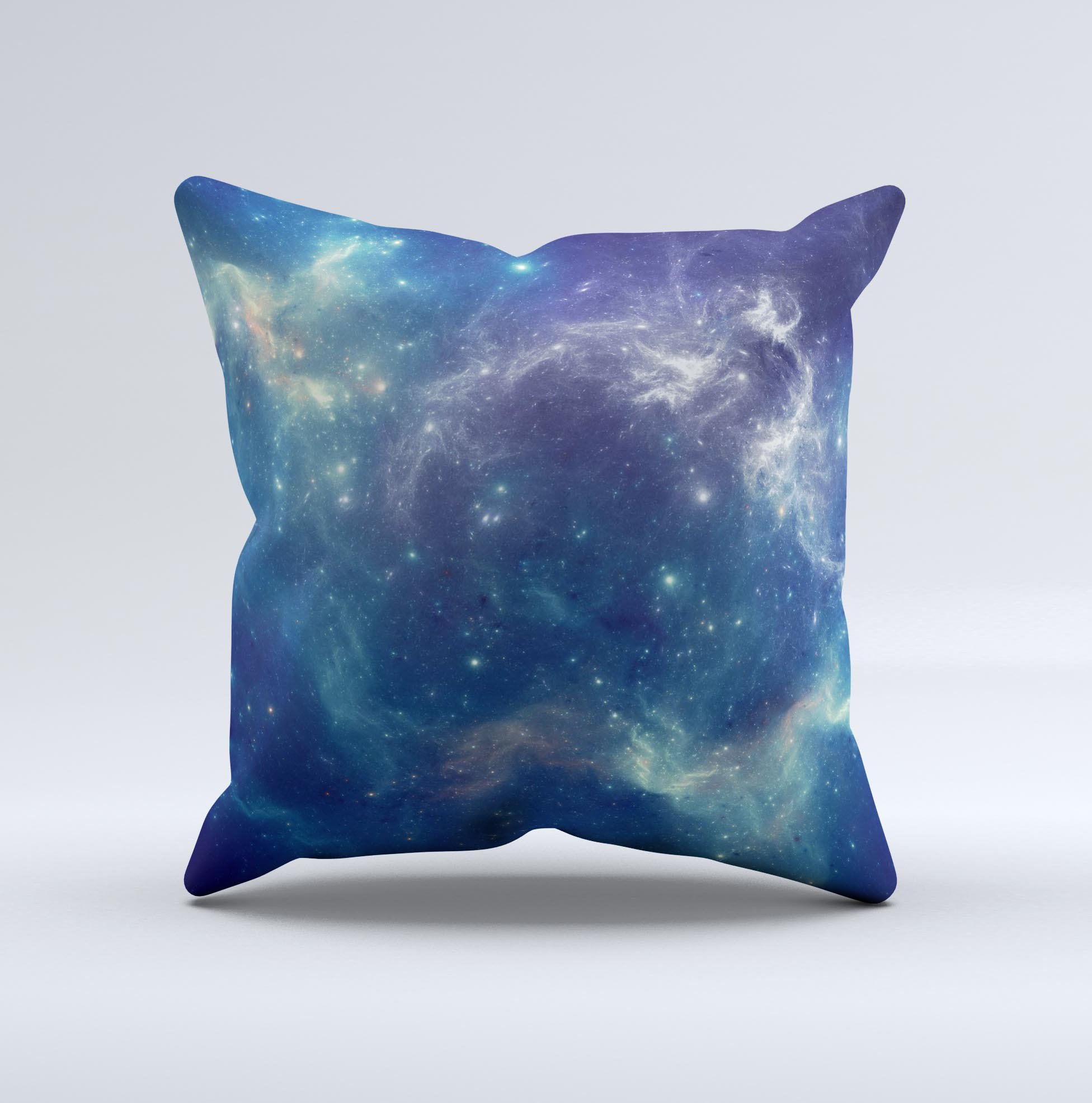 A decorative throw pillow featuring a subtle blue and green nebula design, handcrafted in Virginia with high thread count fabric and polyester filling.