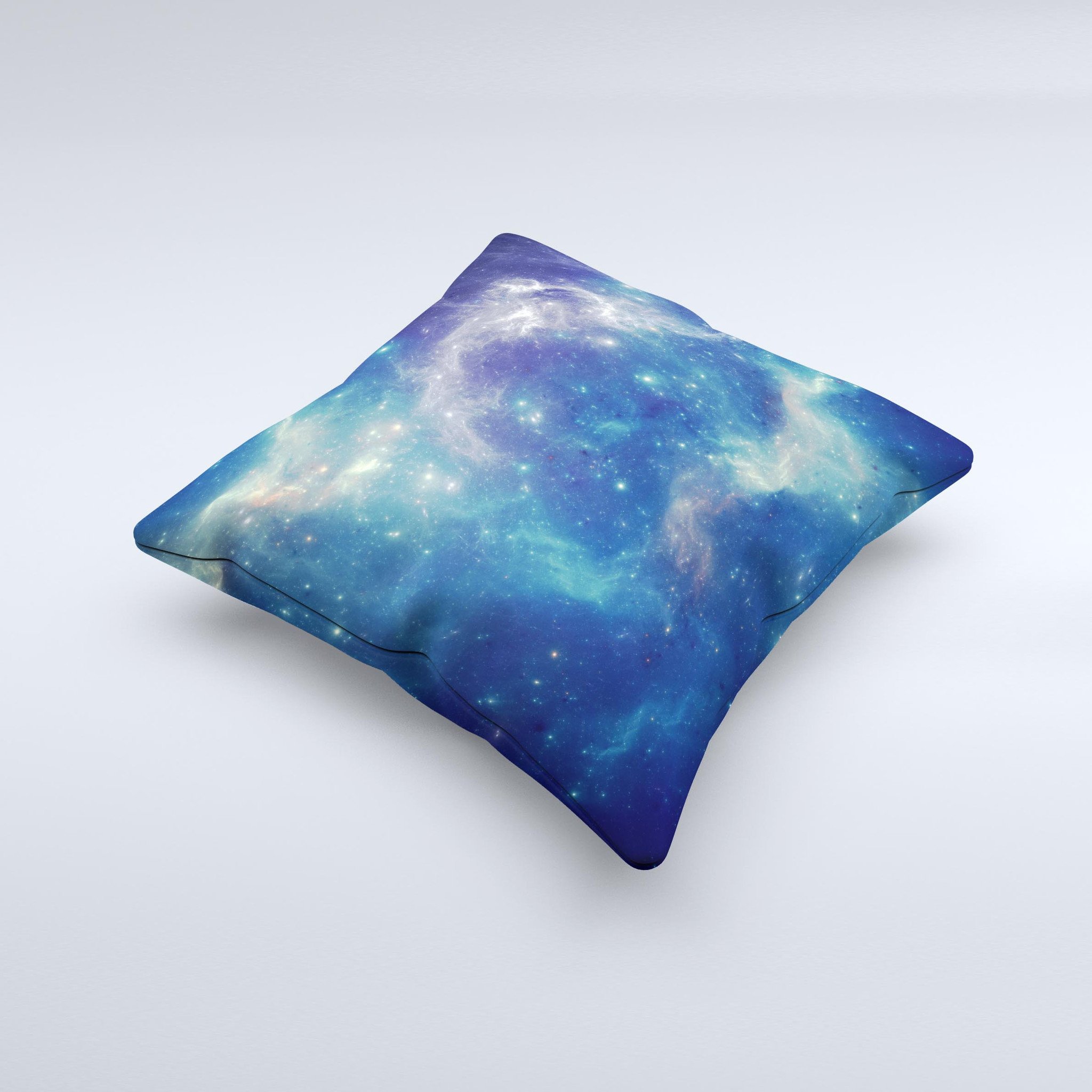 A decorative throw pillow featuring a subtle blue and green nebula design, handcrafted in Virginia with high thread count fabric and polyester filling.