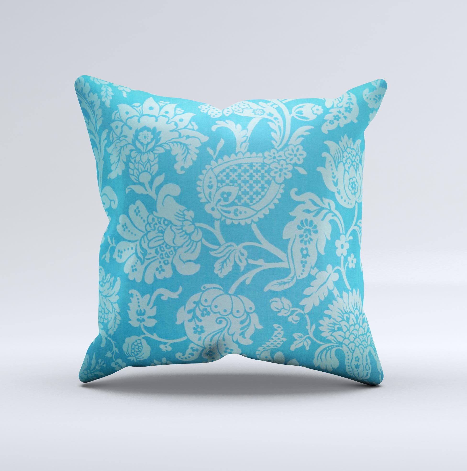 Subtle blue floral lace pattern decorative throw pillow with intricate design, showcasing its handmade quality and soft fabric.