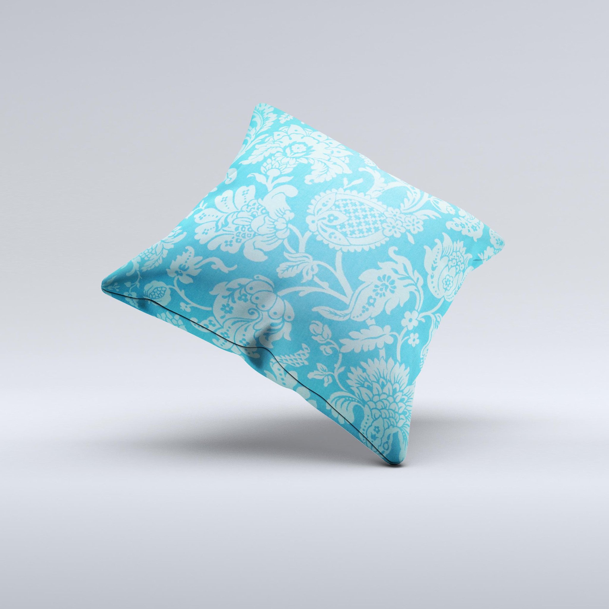 Subtle blue floral lace pattern decorative throw pillow with intricate design, showcasing its handmade quality and soft fabric.