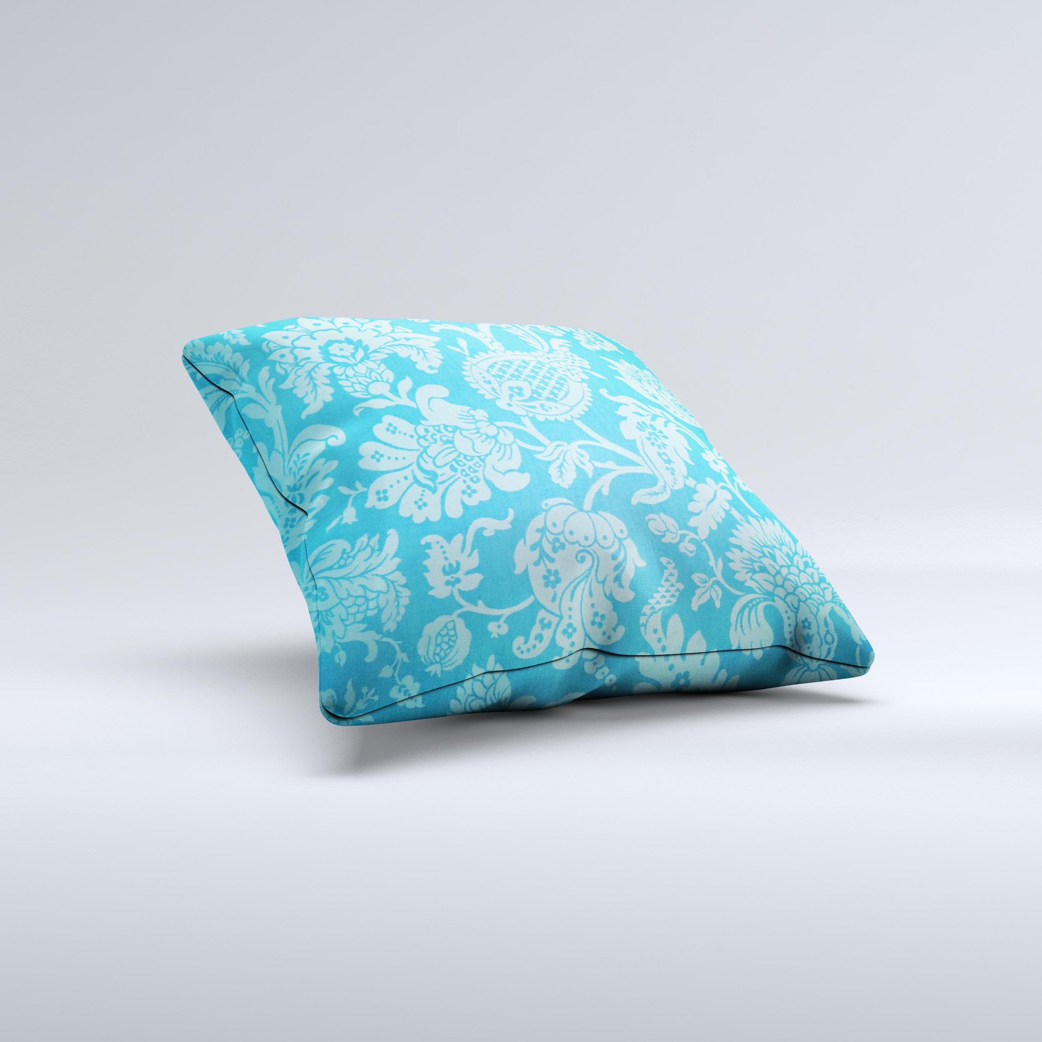 Subtle blue floral lace pattern decorative throw pillow with intricate design, showcasing its handmade quality and soft fabric.