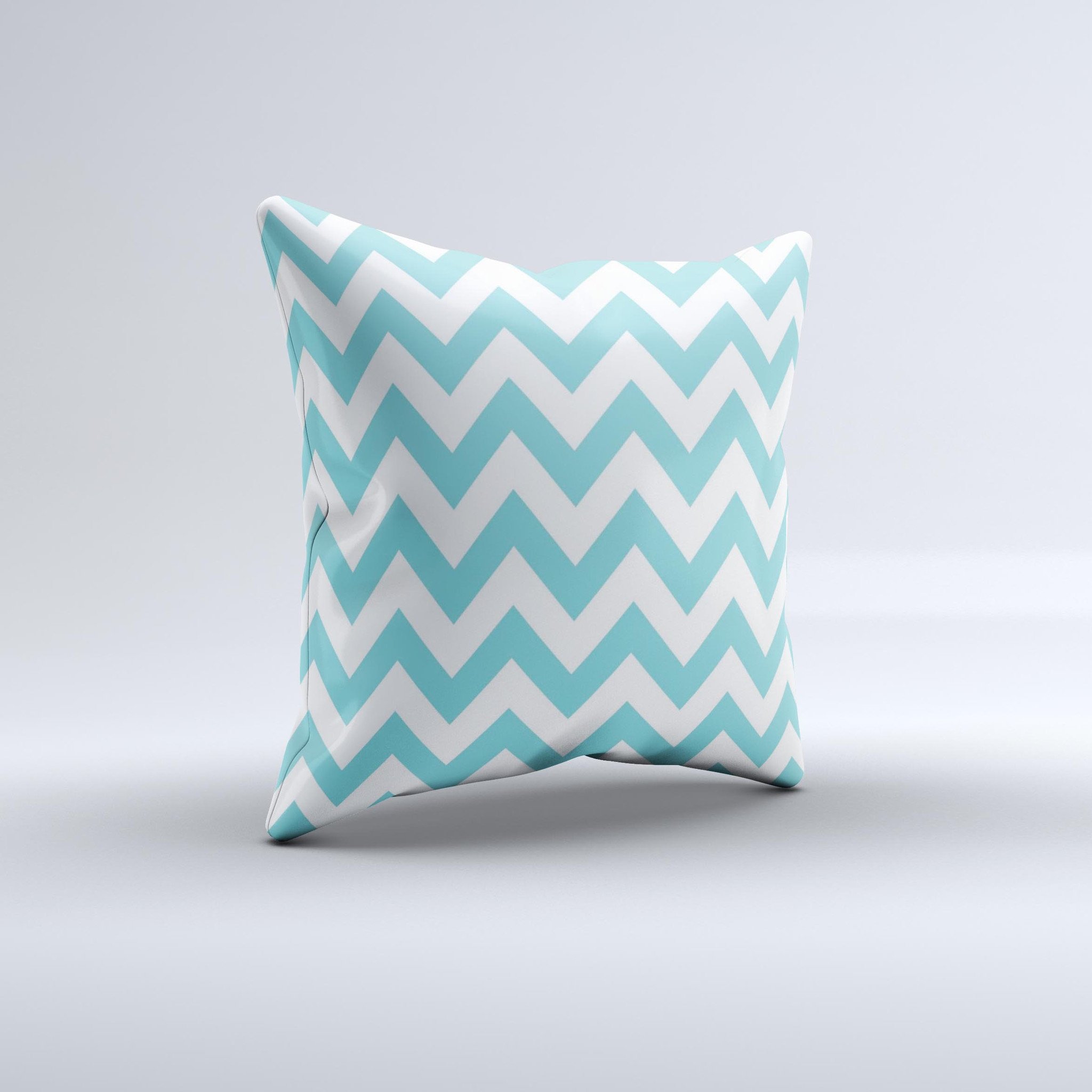 Subtle blue and white chevron pattern decorative throw pillow, handcrafted in Virginia with high thread count fabric and polyester filling.