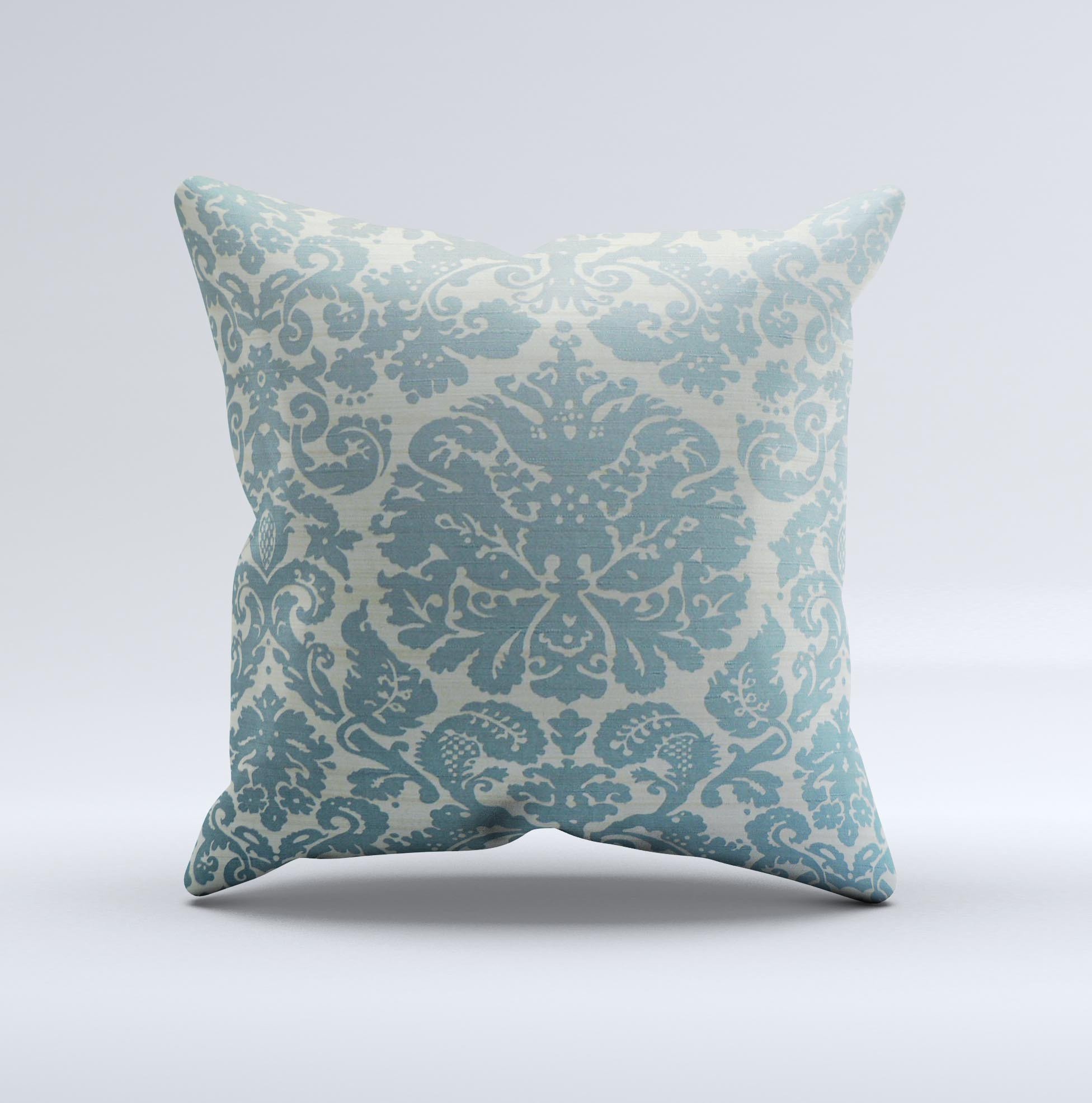 Subtle green decorative throw pillow with lace pattern, handcrafted in Virginia, showcasing unique ink-fuzed design and high-quality fabric.