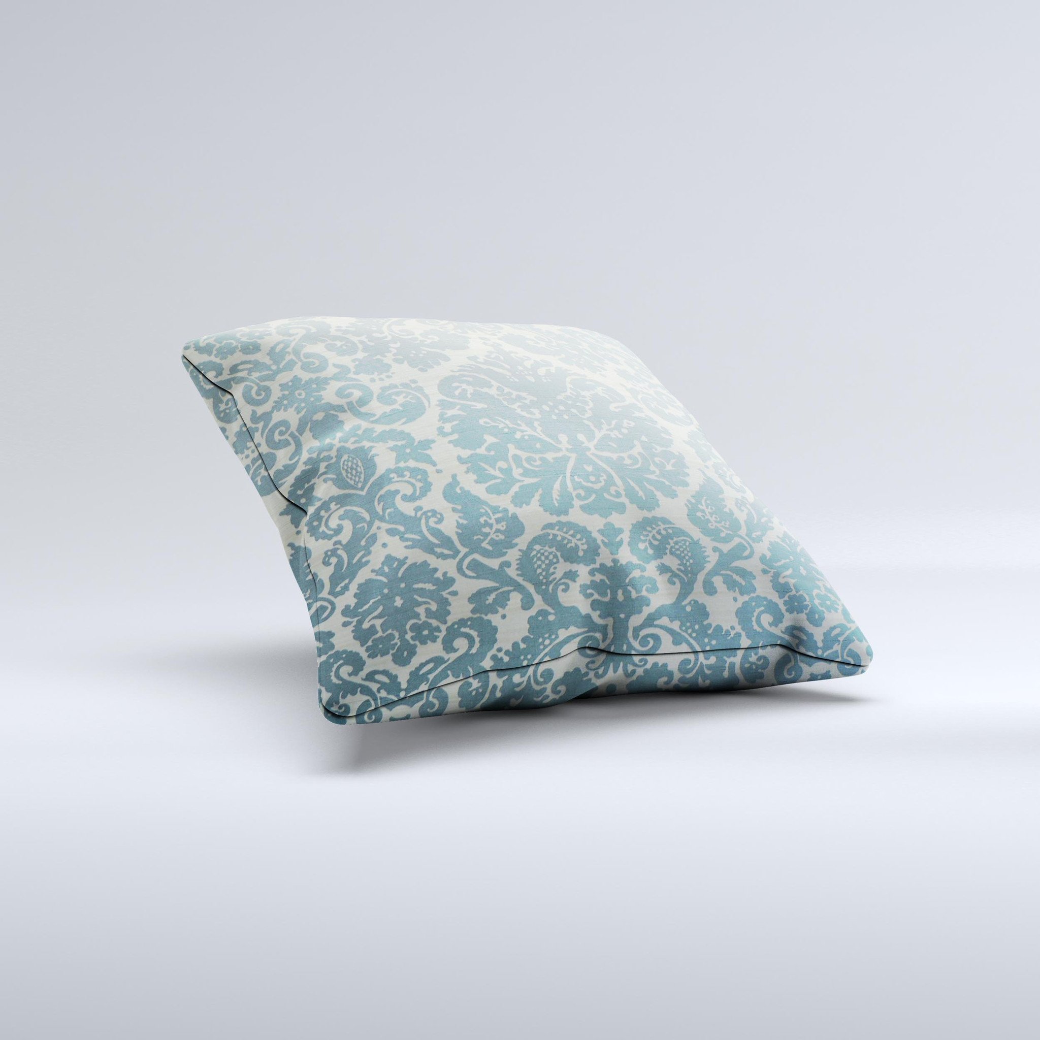 Subtle green decorative throw pillow with lace pattern, handcrafted in Virginia, showcasing unique ink-fuzed design and high-quality fabric.