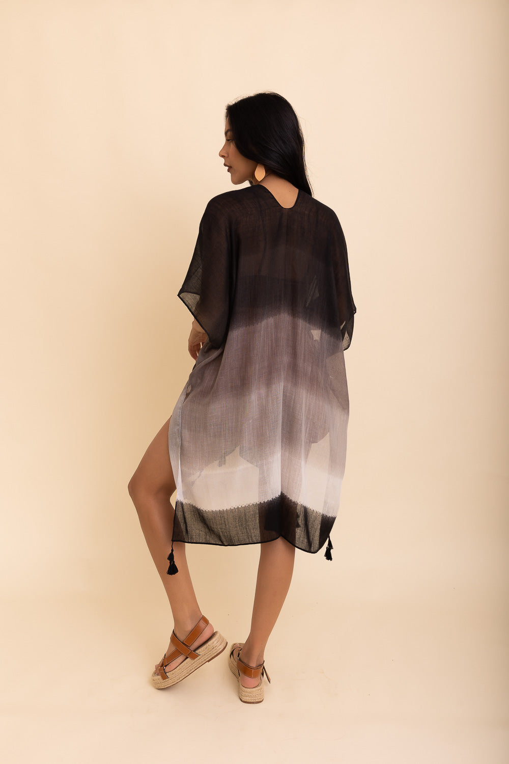 A stylish Summer Multi Gradient Kimono featuring softly-blended colors, perfect for summer outfits.