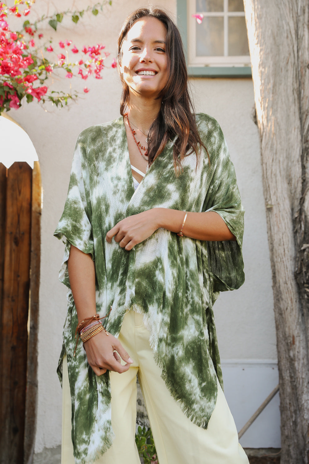 A vibrant Summer Tie-Dye Kimono featuring colorful patterns, perfect for summer festivals and outdoor events, made from lightweight fabric.