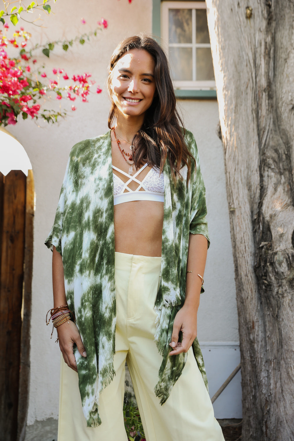 A vibrant Summer Tie-Dye Kimono featuring colorful patterns, perfect for summer festivals and outdoor events, made from lightweight fabric.