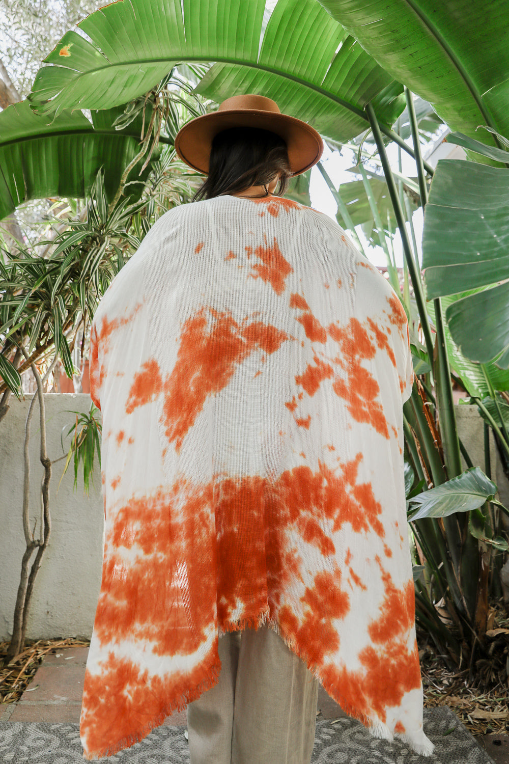 A vibrant Summer Tie-Dye Kimono featuring colorful patterns, perfect for summer festivals and outdoor events, made from lightweight fabric.