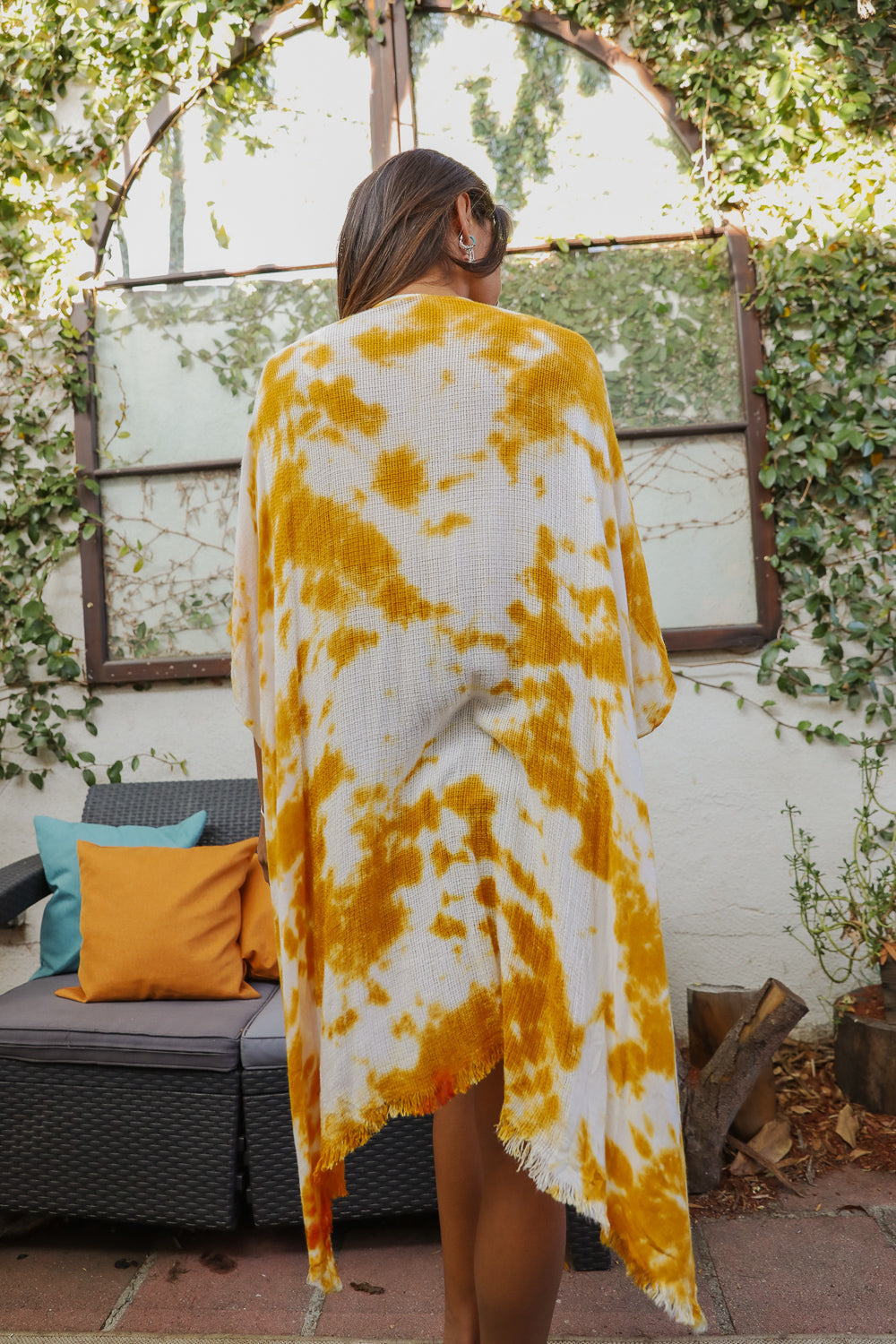 A vibrant Summer Tie-Dye Kimono featuring colorful patterns, perfect for summer festivals and outdoor events, made from lightweight fabric.