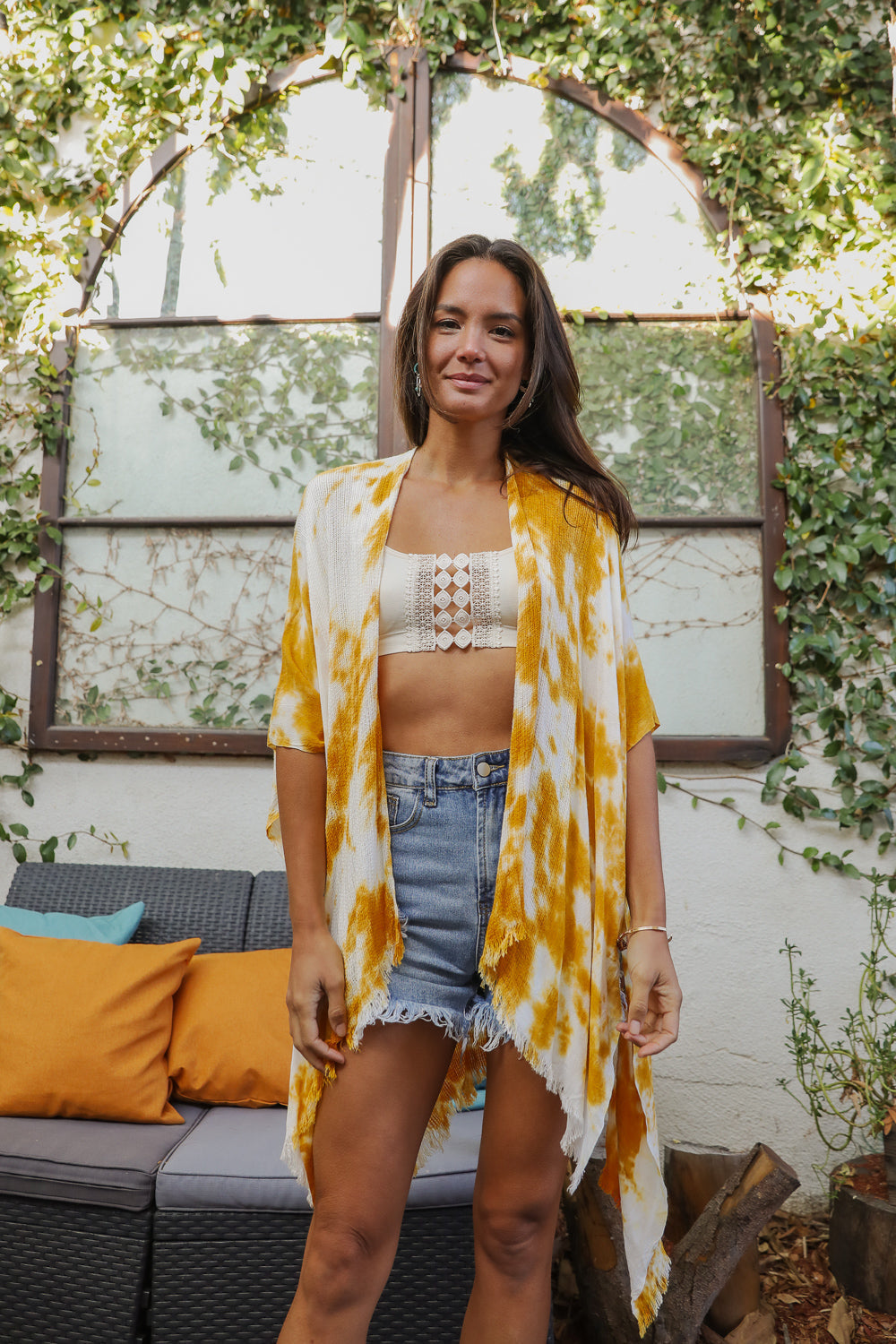 A vibrant Summer Tie-Dye Kimono featuring colorful patterns, perfect for summer festivals and outdoor events, made from lightweight fabric.