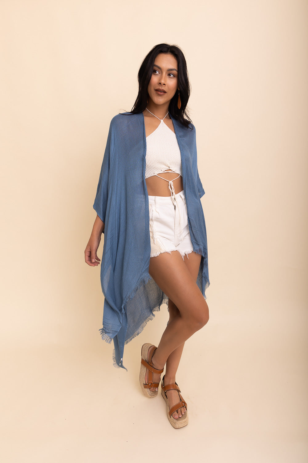 A vibrant Sun-kissed Breeze Frayed Trim Kimono with playful frayed edges, perfect for summer styling.