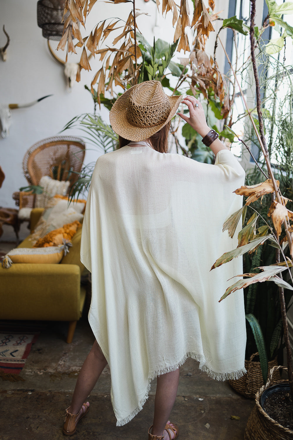 A vibrant Sun-kissed Breeze Frayed Trim Kimono with playful frayed edges, perfect for summer styling.