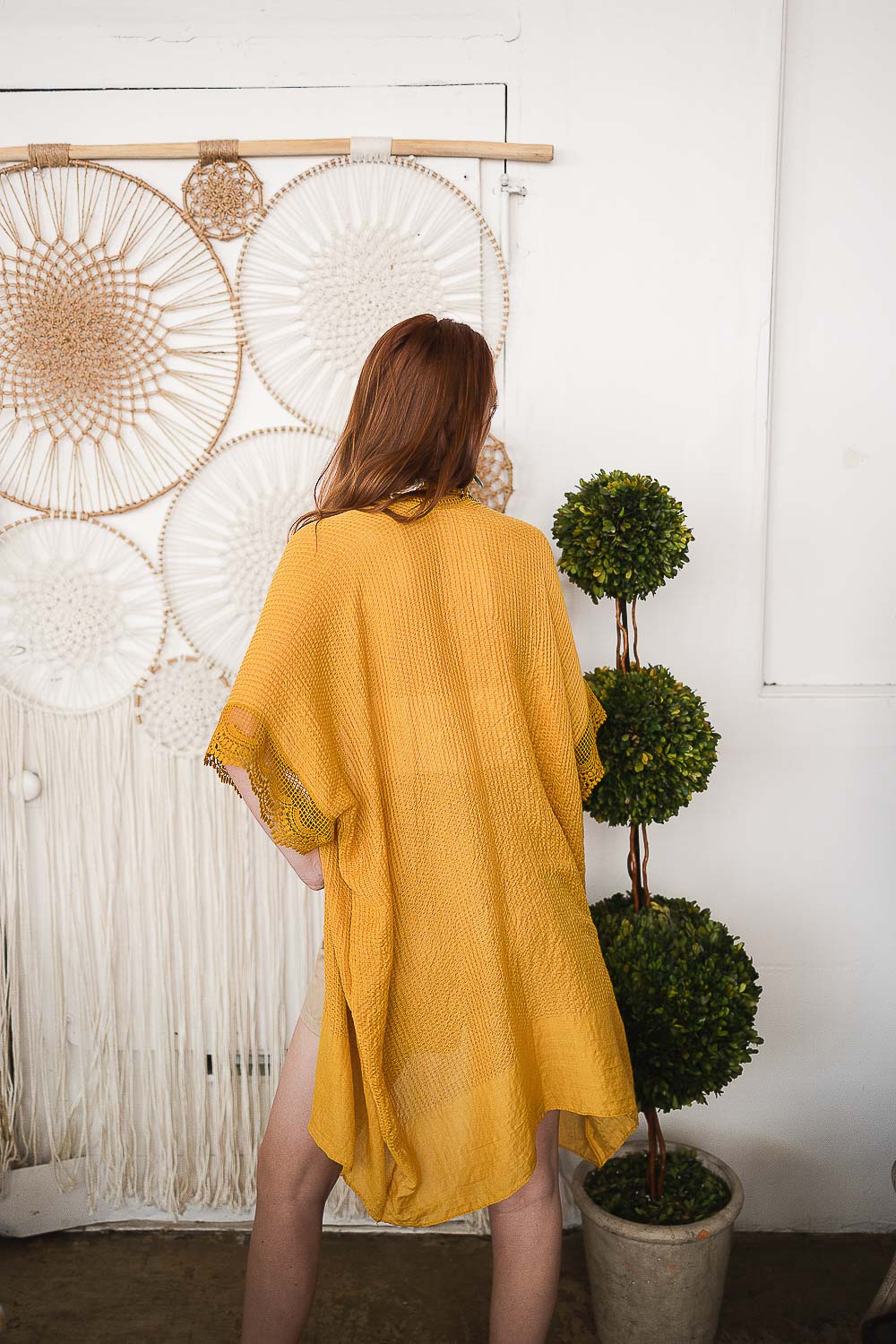 A stylish Sunshine Lace Trim Kimono featuring crochet scalloped lace trim in a solid color, perfect for summer layering.