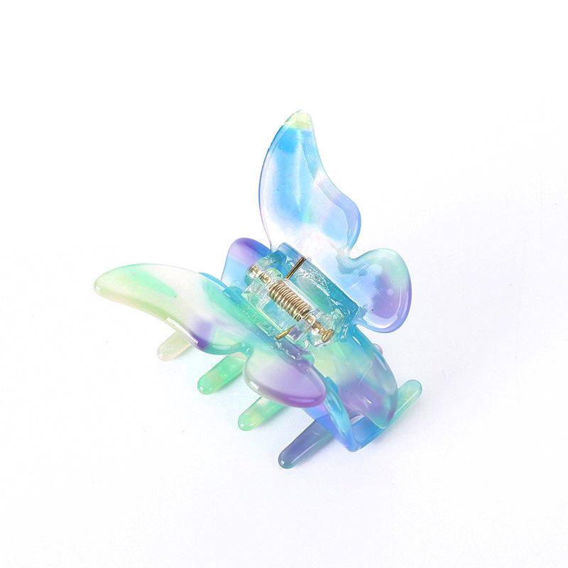 A medium-sized sweet butterfly jaw clip featuring a colorful butterfly design, perfect for securing hair in style.