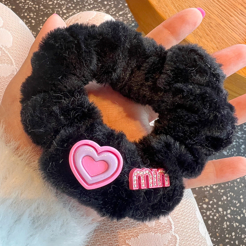 Sweet & Cute Rabbit Hair Tie featuring a heart-shaped design, perfect for adding charm to hairstyles.