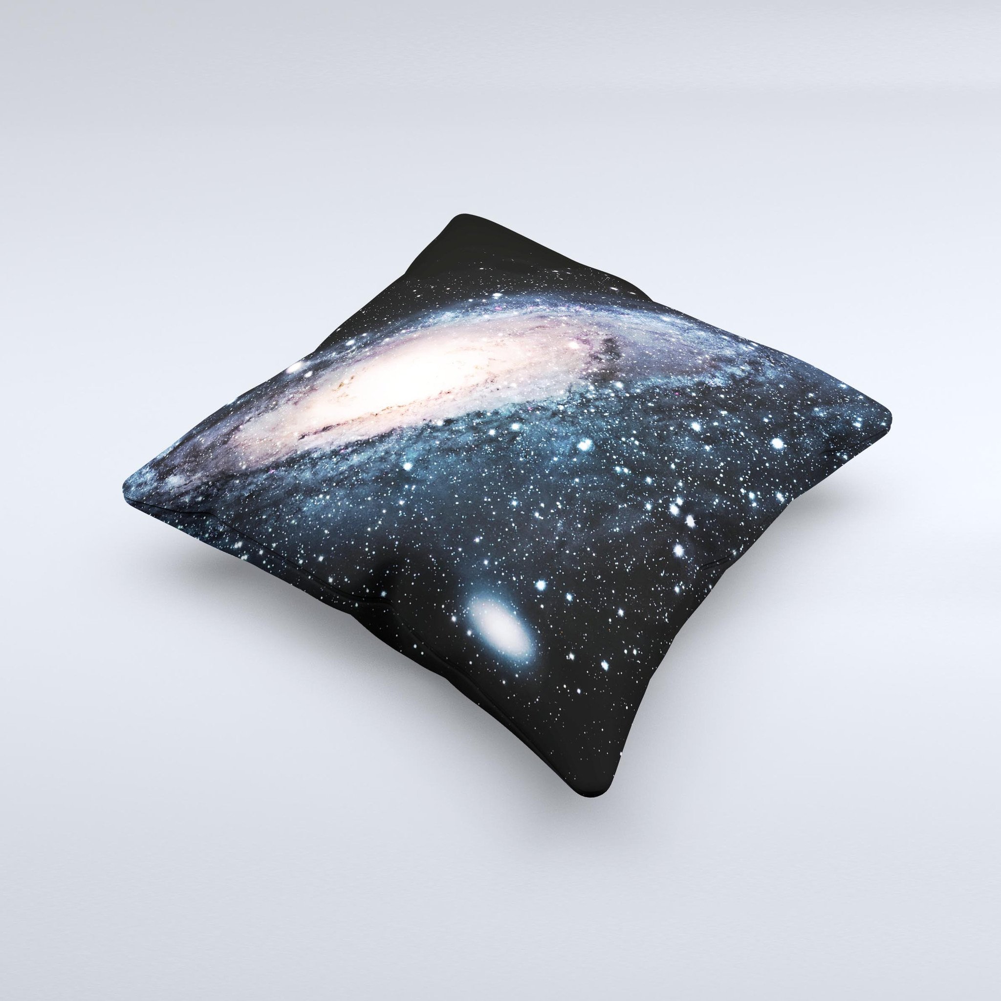 A decorative throw pillow featuring a swirling galaxy design with glowing stars, showcasing vibrant colors and a unique handcrafted appearance.