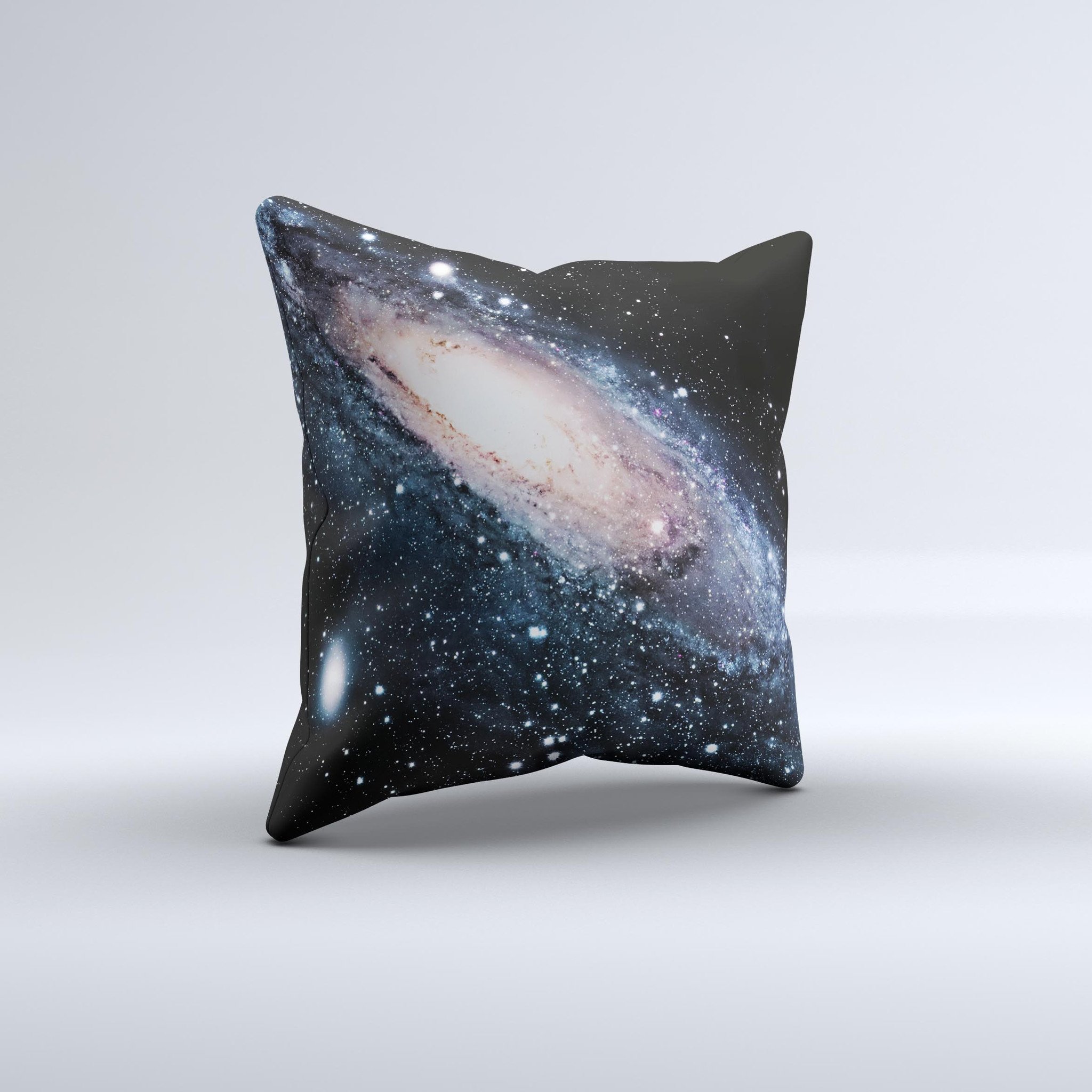 A decorative throw pillow featuring a swirling galaxy design with glowing stars, showcasing vibrant colors and a unique handcrafted appearance.