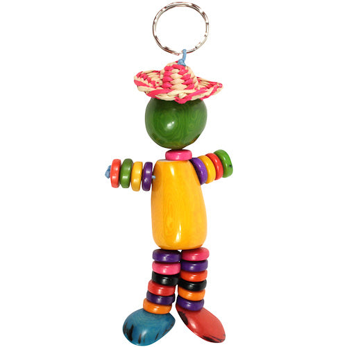 Colorful Tagua Nut Key Chain shaped like a doll, featuring a charming hat, showcasing unique patterns and eco-friendly craftsmanship.