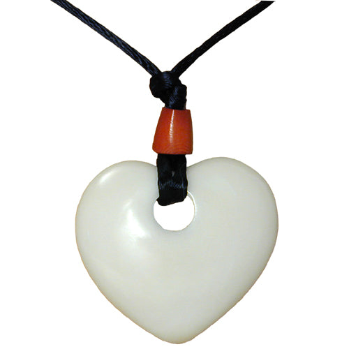 Handcrafted Tagua Nut Natural Heart Pendant from Ecuador, showcasing its unique heart shape and natural color variations.